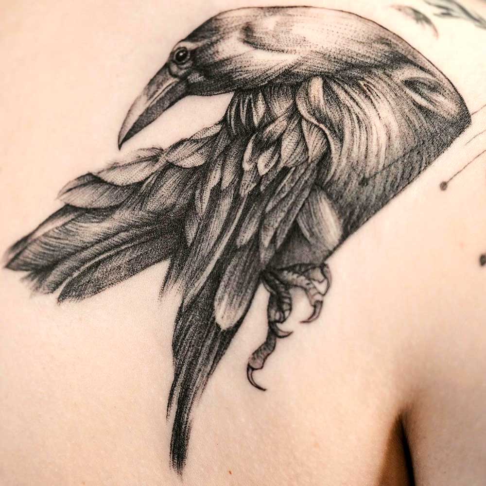 Crow-tattoo-on-back-meaning
