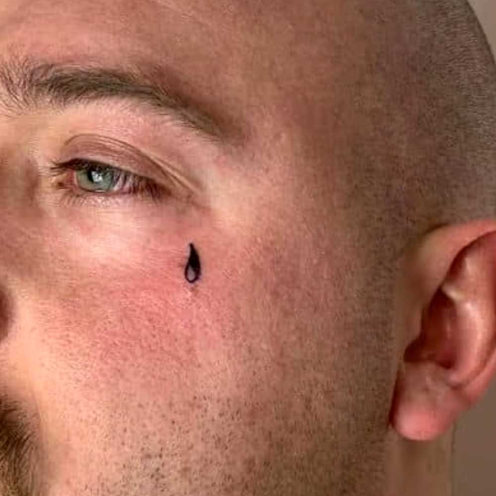 Teardrop tattoo on face meaning